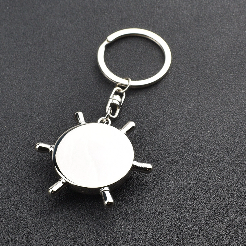 Llavero Metalico en forma de Timon con Brujula, 4.9 x 4.3 cmts