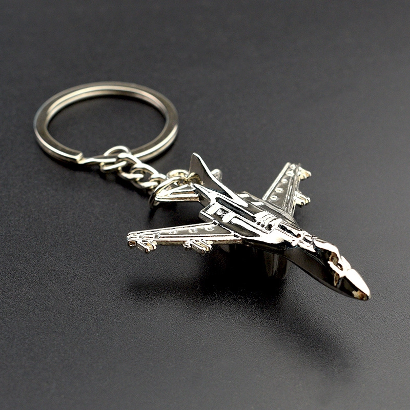 Llavero Metalico en forma de Avion, 4.4 x 5.6 cmts