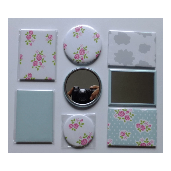 Espejo Redondo, impresion full color plastificada sobre acero 6.8 x 6.8 cmts