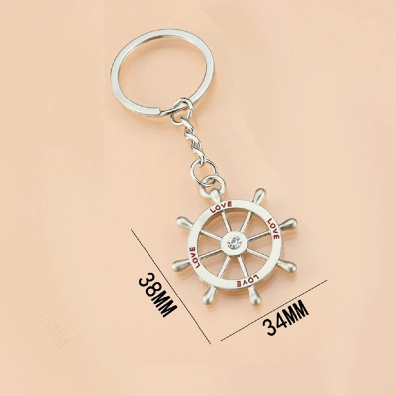 Llavero Metalico diseño Timon de Barco, tamaño 3.8 x 3.4 cmts