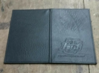 Porta Cuenta Santo Domingo, en imitacion cuero 13.5 x 22 cmts cerrado