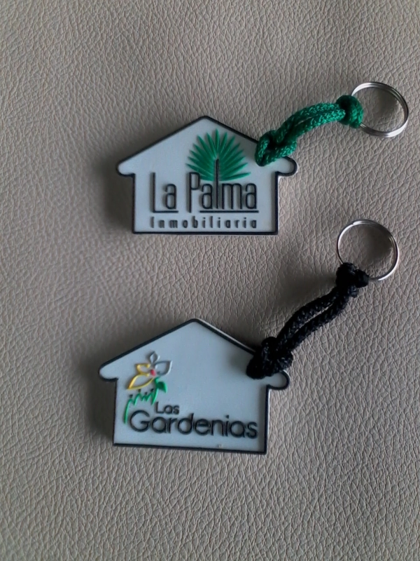 Llavero Microinyectado en forma de Casa, 6 x 4 cmts
